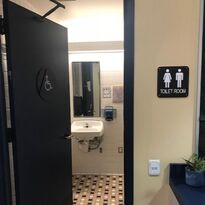 Picture of an all-gender restroom in the CDC